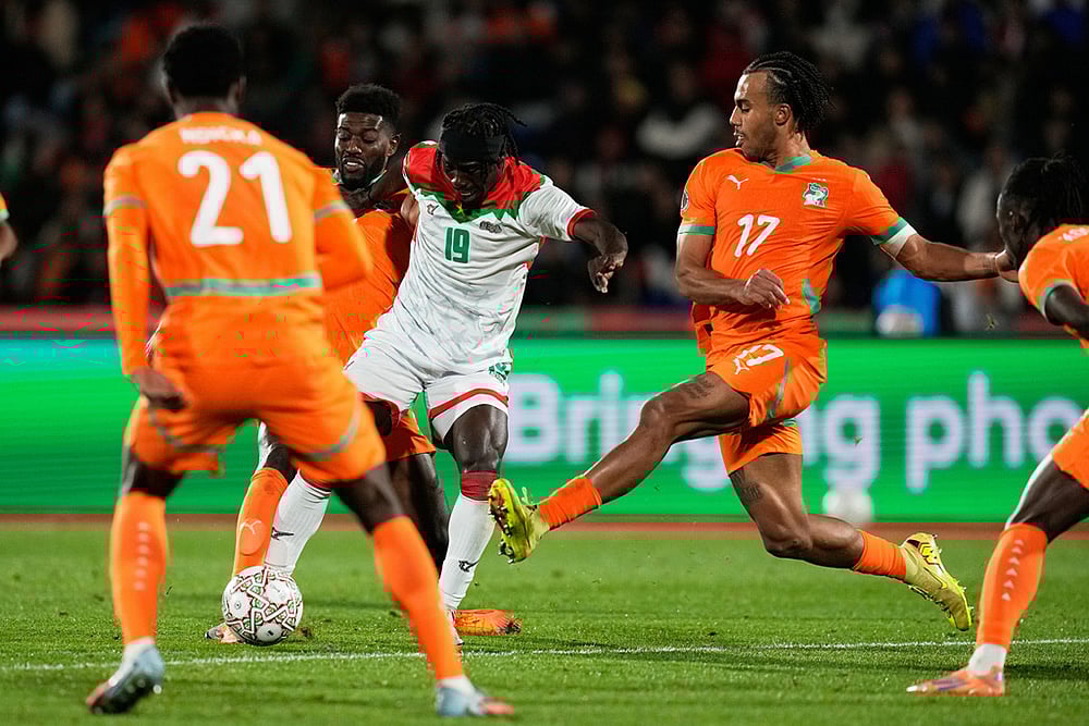 Ivory Coast and Burkina Faso Cup of Nations soccer-Guela Doue