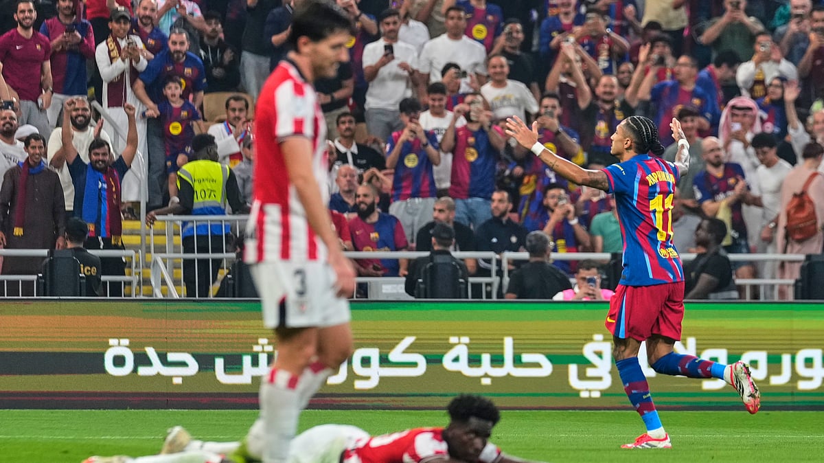 Barcelona's Raphinha celebrates after scoring the fifth goal during the Spanish Super Cup semifinal soccer match against Athletic Club Bilbao at King Abdullah Sports City Stadium in Jeddah, Saudi Arabia, Wednesday, Jan. 7, 2026. - (AP Photo/Altaf Qadri)