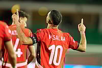 Egypt 3-1 Benin, Africa Cup Of Nations Round Of 16: Mohamed Salah Seals Nervous Win For Pharaohs | Photo: AP/Mosa'ab Elshamy : Egypt's Mohamed Salah celebrates after scoring his side's third goal during the Africa Cup of Nations round of 16 soccer match between Egypt and Benin in Agadir, Morocco.