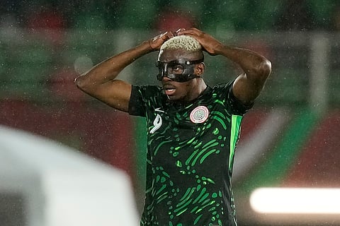 Nigeria's Victor Osimhen reacts during the Africa Cup of Nations round of 16 soccer match between Nigeria and Mozambique in Fez, Morocco.