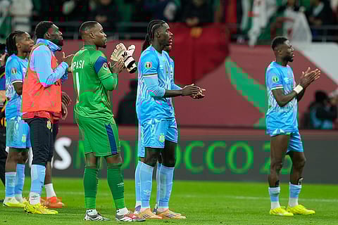 DR Congo players applaud their fans after the Africa Cup of Nations round of 16 soccer match between Algeria and DR Congo in Rabat, Morocco.