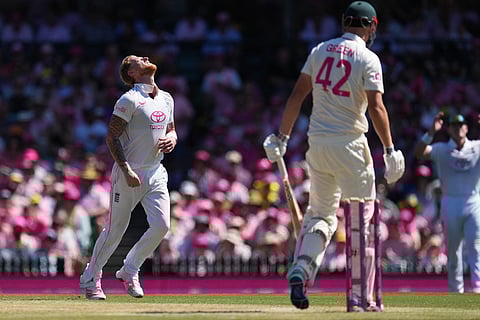 England's Ben Stokes reacts during play on day three of the fifth and final Ashes cricket test between England and Australia in Sydney.