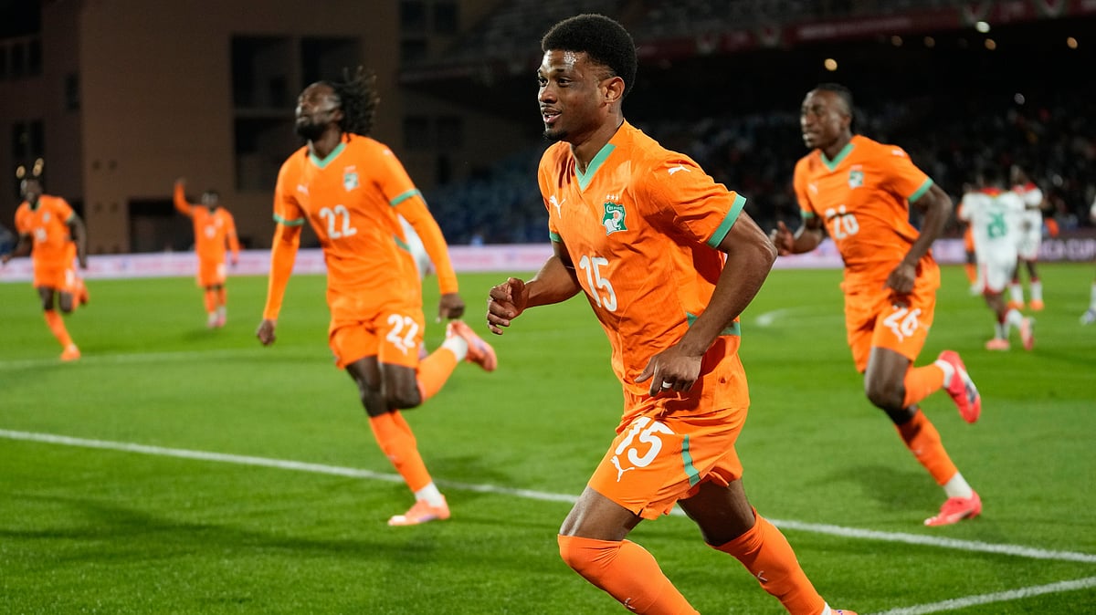 Ivory Coast's Amad Diallo celebrates after scoring his sides first goal during the Africa Cup of Nations best of 16 soccer match between Ivory Coast and Burkina Faso in Marrakech, Morocco, Tuesday, Jan. 6, 2026.  - (AP Photo/Themba Hadebe)
