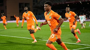 (AP Photo/Themba Hadebe) : Ivory Coast's Amad Diallo celebrates after scoring his sides first goal during the Africa Cup of Nations best of 16 soccer match between Ivory Coast and Burkina Faso in Marrakech, Morocco, Tuesday, Jan. 6, 2026.