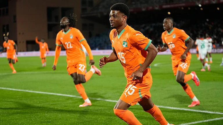 Ivory Coast's Amad Diallo celebrates after scoring his sides first goal during the Africa Cup of Nations best of 16 soccer match between Ivory Coast and Burkina Faso in Marrakech, Morocco, Tuesday, Jan. 6, 2026. - (AP Photo/Themba Hadebe)