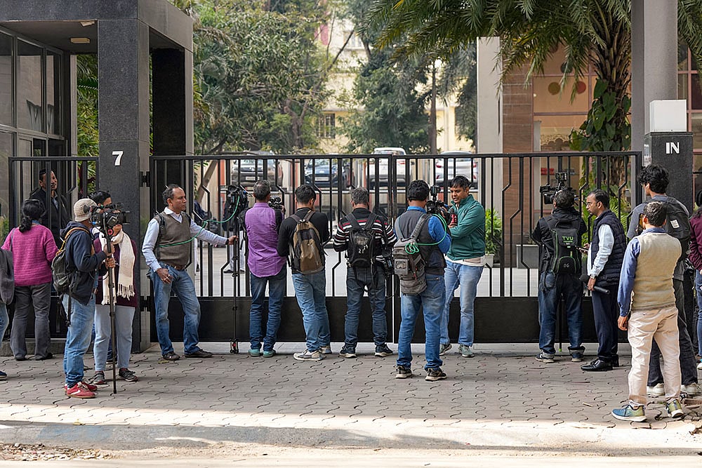 Media personnel outside the residence of Pratik Jain, director of political consultancy firm I-PAC, in Kolkata. The Enforcement Directorate on Thursday conducted searches on the premises of political consultancy firm I-PAC and its director Pratik Jain in Kolkata as part of a money laundering investigation, official sources said. - Photo: PTI/Swapan Mahapatra