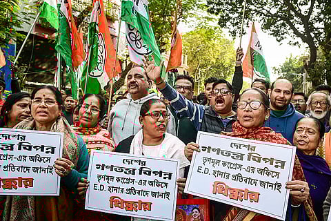 TMC members stage a protest against the Enforcement Directorate's raid at the office of political consultancy firm I-PAC and the home of its director Pratik Jain as part of a money laundering probe into an alleged multi-crore rupee coal pilferage scam, in Kolkata.