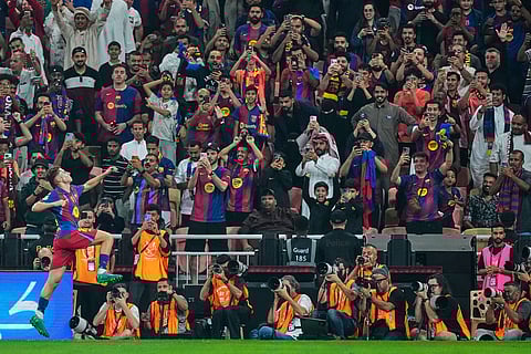 Barcelona's Fermin Lopez celebrates after scoring the second goal during the Spanish Super Cup semifinal soccer match against Athletic Club Bilbao at King Abdullah Sports City Stadium in Jeddah, Saudi Arabia.