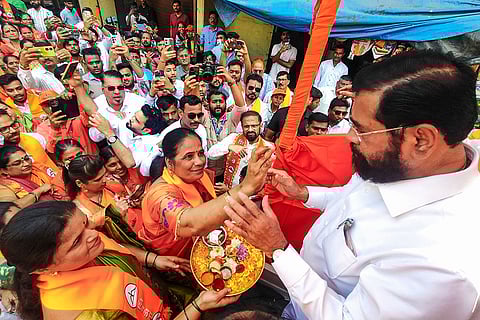 Maharashtra Deputy Chief Minister Eknath Shinde, right, campaigns for Shiv Sena (Eknath Shinde faction) candidates contesting the Navi Mumbai Municipal Corporation (NMMC) elections, in Navi Mumbai.