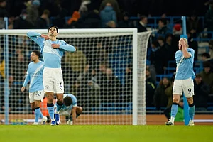 | Photo: AP/Dave Thompson : Manchester City's Tijjani Reijnders, left, and Manchester City's Erling Haaland react at the end of the English Premier League soccer match between Manchester City and Brighton and Hove Albion in Manchester, England.