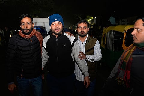 Meeran Haider is accompanied by friends and relatives outside Tihar jail.