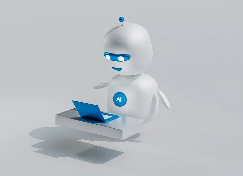 3D cartoon robot working on a blue laptop at a desk
