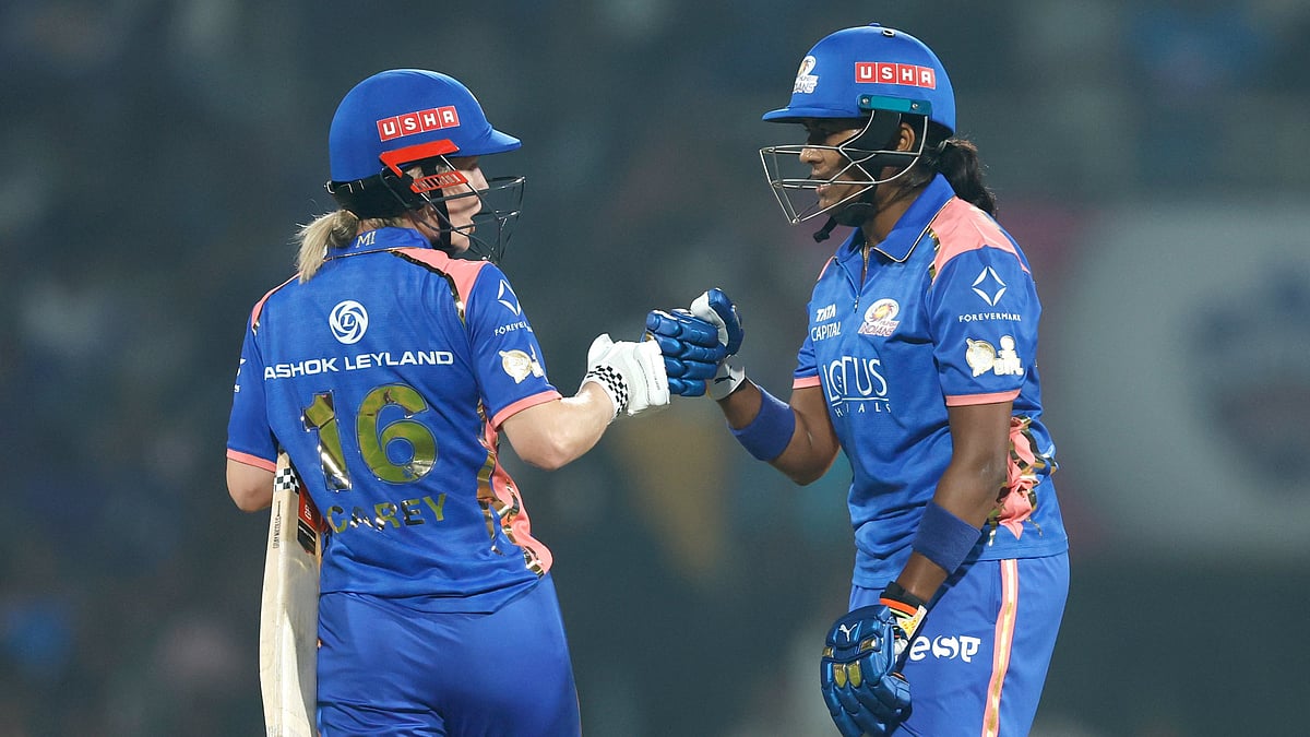 Sajeevan Sajana and Nicola Carey stabilize Mumbai Indians' innings with a 66-run stand for the 5th wicket after early jitters against RCB. - X/WPL