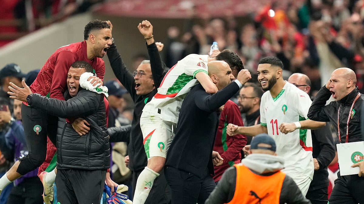 Morocco players celebrate after the Africa Cup of Nations quarterfinal soccer match between Cameroon and Morocco, in Rabat, Morocco, Friday, Jan. 9, 2026. - (AP Photo/Mosa'ab Elshamy)