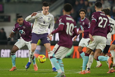 Manchester United's Benjamin Sesko in atcion during the Premier League soccer match between Burnley and Manchester United in Burnley, England.