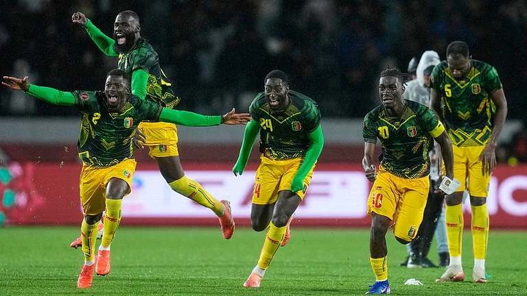 Mali players celebrate after the penalty shootout of the Africa Cup of Nations round of 16 match against Tunisia in Casablanca, Morocco. - Photo: AP