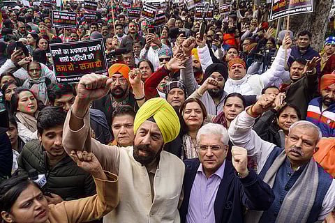 BJP leaders stage a protest against the alleged insult of Sikh Guru Tegh Bahadur, by Leader of Opposition in the Delhi Assembly and AAP leader Atishi, in New Delhi.