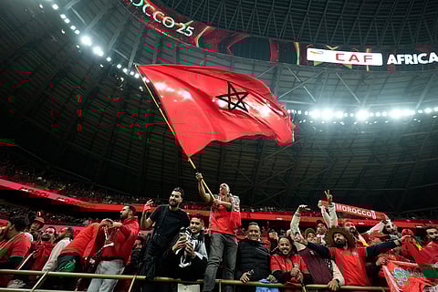 Morocco supporters celebrate after the Africa Cup of Nations quarterfinal soccer match between Cameroon and Morocco, in Rabat, Morocco.