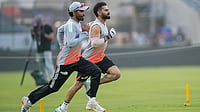PTI : Virat Kohli, back, and Ravindra Jadeja during a practice session ahead of the first ODI match between India and New Zealand, at Kotambi Stadium in Vadodara.
