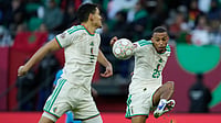 Photo: AP : Algeria's Rafik Belghali, right, kicks the ball during the Africa Cup of Nations round of 16 match between Algeria and DR Congo in Rabat.