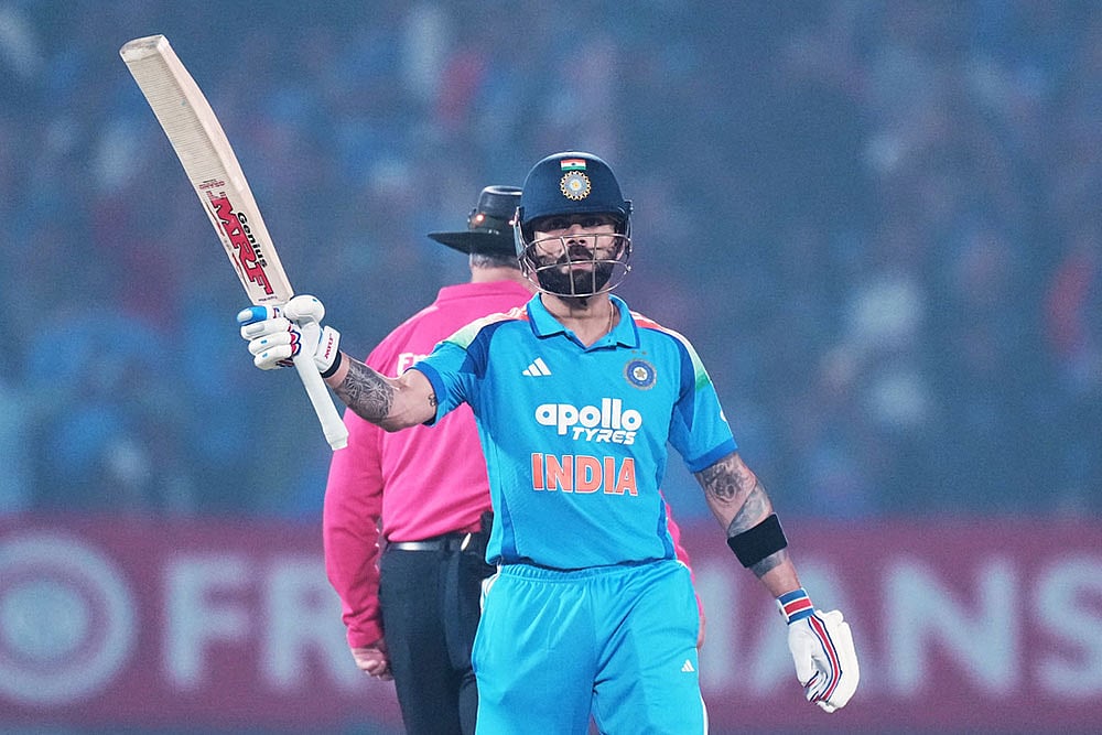 Indias Virat Kohli celebrates his fifty runs