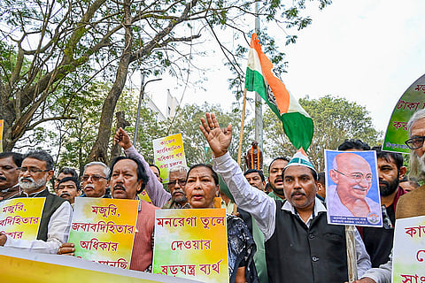 Tripura Pradesh Congress members stage a mass hunger strike demanding restoration of the Mahatma Gandhi National Rural Employment Guarantee Act (MGNREGA), in Agartala.