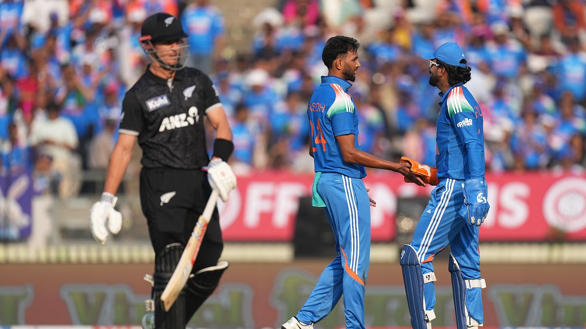 New Zealand's Mitchell Hay, left, leaves the field after getting bowled out by India's Prasidh Krishna, center, during the first One Day International cricket match between India and New Zealand in Vadodara, India, Sunday, Jan. 11, 2026. - (AP Photo/Ajit Solanki)