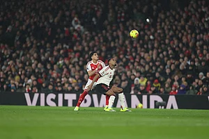 | Photo: AP/Ian Walton : English Premier League soccer match between Arsenal and Liverpool in London.