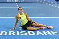 Brisbane International Final: Aryna Sabalenka Trounces Marta Kostyuk, Lifts Second Title In Row | Photo: AP/Tertius Pickard : Aryna Sabalenka of Belarus poses with the winners trophy after winning the women's final match against Marta Kostyuk of Ukraine 6-4, 6-3, at the Brisbane International tennis tournament in Brisbane, Australia.