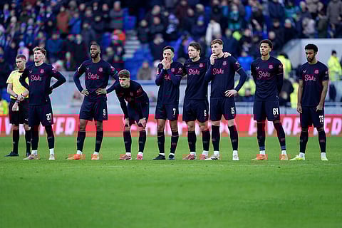 Everton players appear dejected at the end of the penalty shoot-out of the Emirates FA Cup third round match between Everton and Sunderland in Liverpool, England.