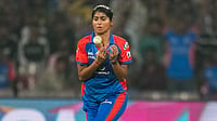 PTI : Delhi Capitals' Nandini Sharma takes the catch of Gujarat Giants' Anushka Sharma during their Women's Premier League match at the DY Patil Stadium.