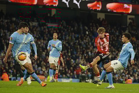 Exeter City's George Birch scores during the FA Cup third round match between Manchetster City and Exeter City in Manchester, England.