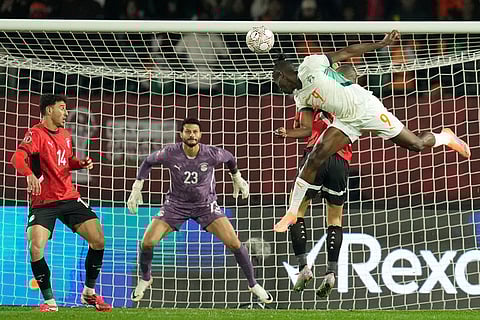 Ivory Coast's Vakoun Issouf Bayo heads the ball toward goal during the Africa Cup of Nations quarterfinal soccer match between Egypt and Ivory Coast, in Agadir, Morocco.