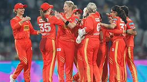 | Photo: X/wplt20 : Gujarat Giants' Sophie Devine celebrates a wicket during the Women's Premier League match against Delhi Capitals on January 11, 2026.