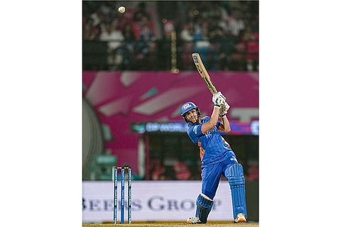 Mumbai Indians' Nat Sciver-Brunt plays a shot during a Women's Premier League (WPL) T20 cricket match between Mumbai Indians and Delhi Capitals, at the DY Patil Stadium, in Navi Mumbai.
