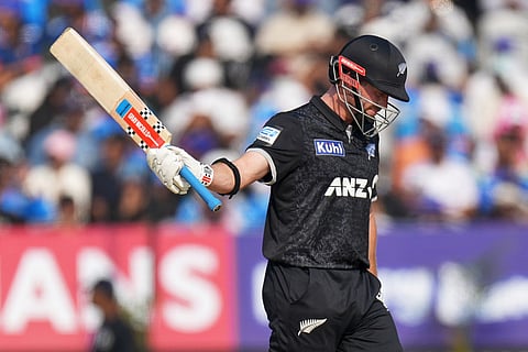 New Zealand's Henry Nicholls celebrates his fifty runs during the first One Day International cricket match between India and New Zealand in Vadodara, India.