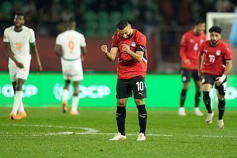 Egypt's Mohamed Salah celebrates at the end of the Africa Cup of Nations quarterfinal soccer match between Egypt and Ivory Coast, in Agadir, Morocco.