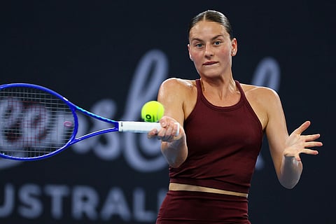 Marta Kostyuk of Ukraine plays a shot during the women's final match against Aryna Sabalenka of Belarus at the Brisbane International tennis tournament in Brisbane, Australia.
