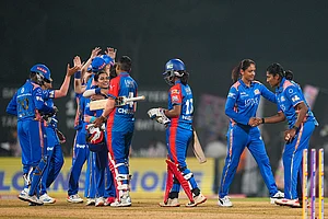 | Photo: PTI/Kunal Patil : Mumbai Indians' players being congratulated by Delhi Capitals' Shree Charani and Nandani Sharma after winning the Women's Premier League (WPL) T20 cricket match between Mumbai Indians and Delhi Capitals, at the DY Patil Stadium, in Navi Mumbai.