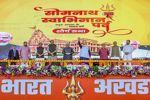 In this image received on Jan. 11, 2026, Prime Minister Narendra Modi along with Gujarat Chief Minister Bhupendra Patel, Deputy Chief Minister Harsh Sanghavi and others during a public meeting following the Shaurya Yatra procession as part of Somnath Swabhiman Parv, in Somnath, Gujarat.