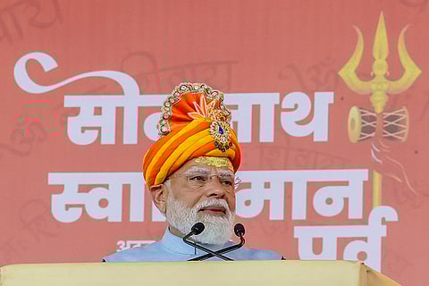 In this image received on Jan. 11, 2026, Prime Minister Narendra Modi addresses a gathering during the Shaurya Yatra procession as part of Somnath Swabhiman Parv, in Somnath, Gujarat.