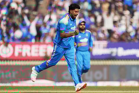 India's Harshit Rana celebrates the wicket of New Zealand's Henry Nicholls during the first One Day International cricket match between India and New Zealand in Vadodara, India.