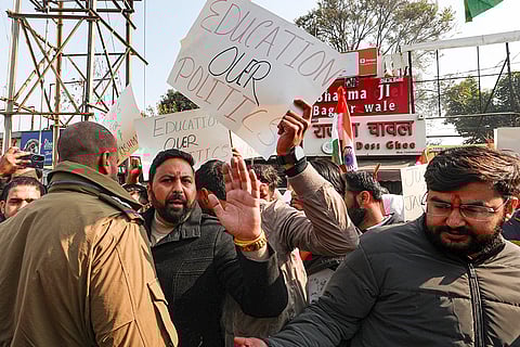 Student wing of the National Conference hold placards during a protest against the withdrawal of the permission letter for Shri Mata Vaishno Devi Medical College, in Jammu.