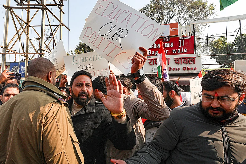 Student wing of the National Conference hold placards