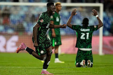 Nigeria's Akor Adams celebrates following the Africa Cup of Nations quarterfinal soccer match between Nigeria and Algeria, in Marrakech, Morocco.