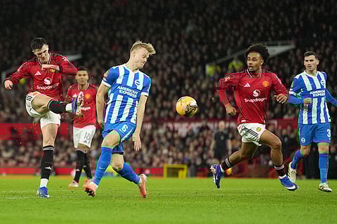 Manchester United's Benjamin Sesko shoots during the FA Cup third round soccer match between Manchester United and Brighton in Manchester, England.