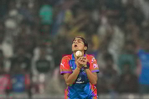 Delhi Capitals' Nandani Sharma takes the catch of Gujarat Giants' Anushka Sharma during a Women's Premier League (WPL) T20 cricket match between Gujarat Giants and Delhi Capitals, at the DY Patil Stadium, in Navi Mumbai.