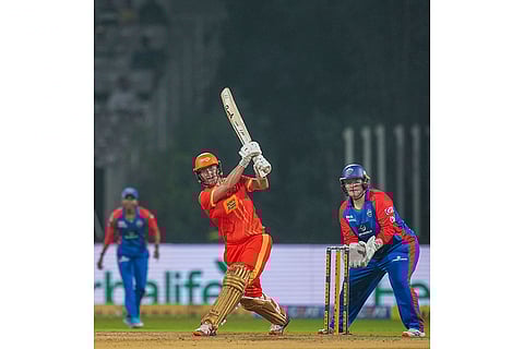 Gujarat Giants' Sophie Devine plays a shot during a Women's Premier League (WPL) T20 cricket match between Gujarat Giants and Delhi Capitals, at the DY Patil Stadium, in Navi Mumbai.