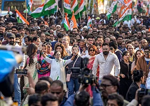 PTI : West Bengal Chief Minister and Trinamool Congress (TMC) chief Mamata Banerjee leads a protest march accompanied by party leaders and others against the Enforcement Directorate's searches linked to political consultancy firm I-PAC, in Kolkata on Friday.