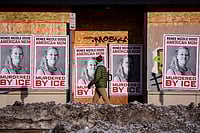 Outrage Over Renee Good’s Death: Minnesota Poet Responds To Chilling ICE Killings Christopher Katsarov : A person walks past signage for Renee Good, who was fatally shot by an ICE officer earlier in the week, in Minneapolis, Minn., Sunday, Jan. 11, 2026.